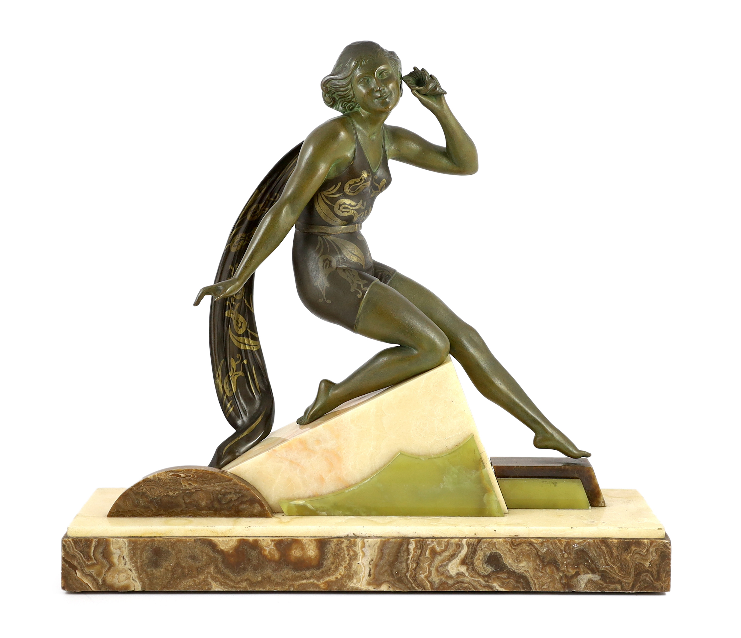 A French Art Deco bronzed spelter and marble figure of a bathing beauty, 58cm wide, 15cm deep, 53cm high